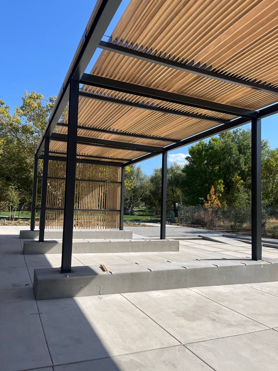 Stained and Painted Shade Structure outside of a community center.