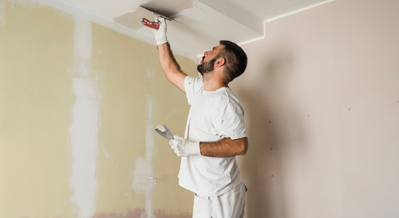 Professional Painter working on a new house.